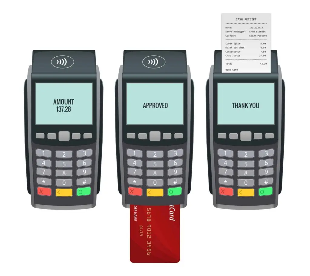 A group of three credit card terminals with one red card.