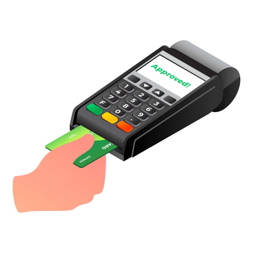 A hand is holding a card reader with two keys.