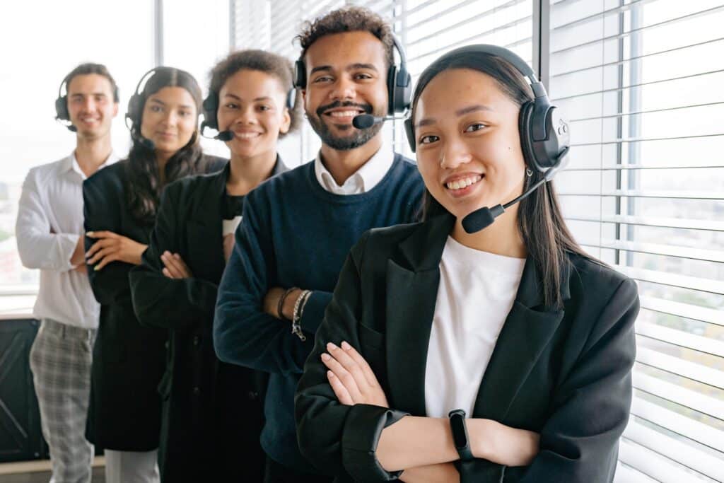 A group of people with headsets on.