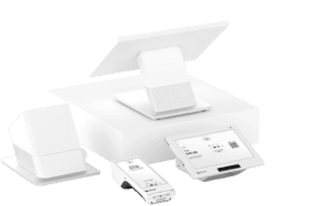 A white printer with two remotes and one ink cartridge.